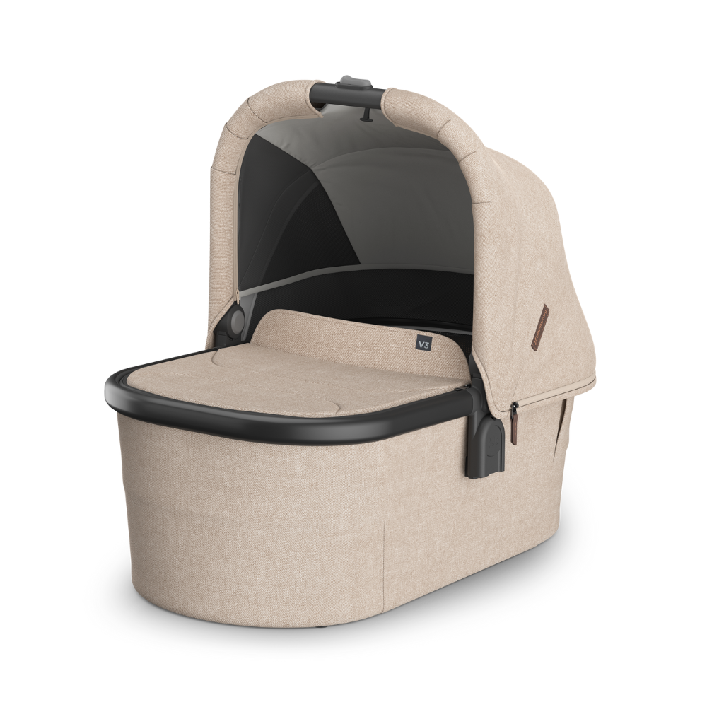 bež košara za novorojenčka